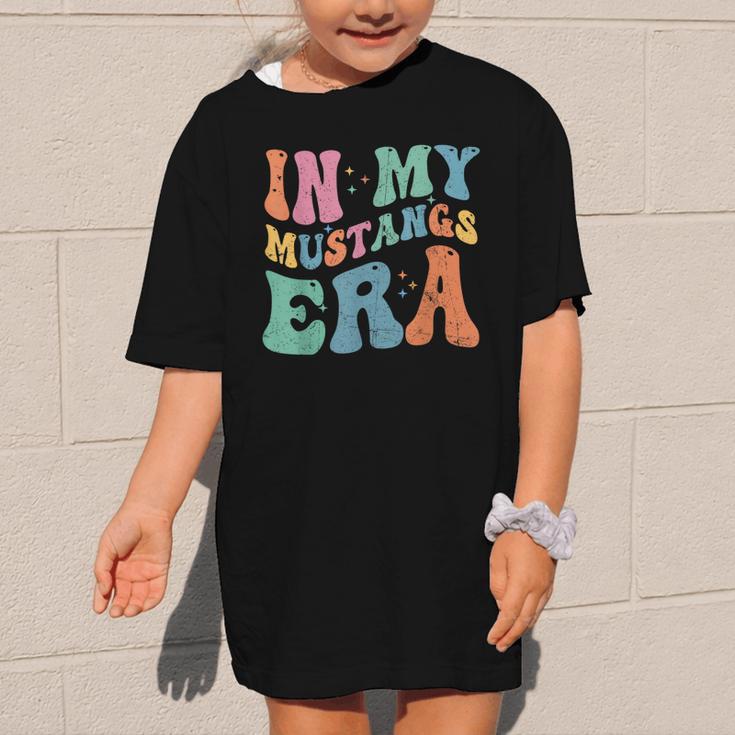 In My Mustangs Era Back To School Spirit Game Retro Groovy Graphic Kid T-Shirt In My Mustangs Era Back To School Spirit Game Retro Groovy Graphic Kid T-Shirt