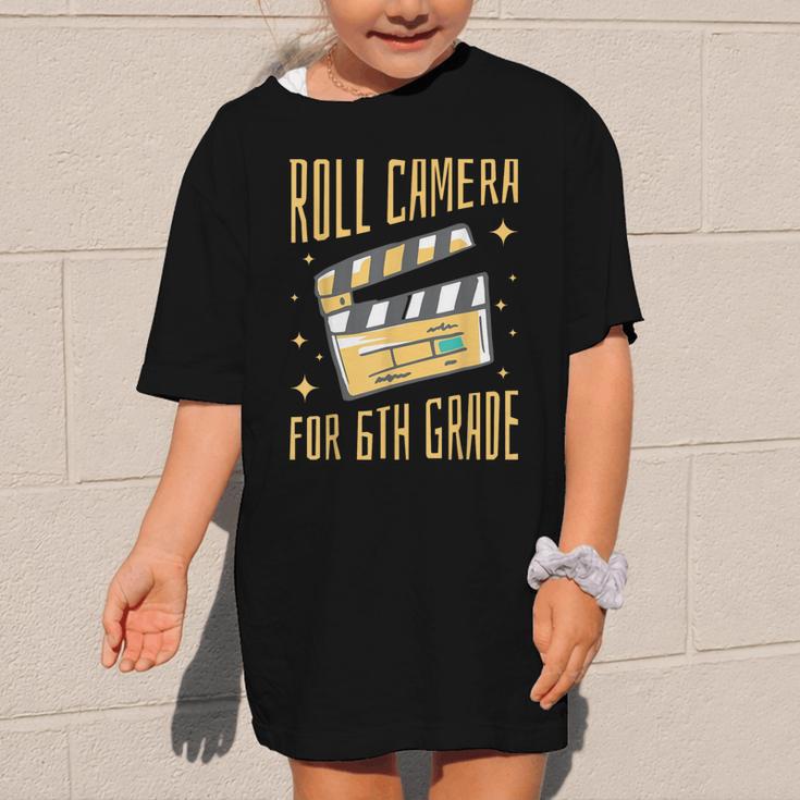 Roll Camera For 6th Grade Movie Lover Back To School Graphic Kid T-Shirt Roll Camera For 6th Grade Movie Lover Back To School Graphic Kid T-Shirt