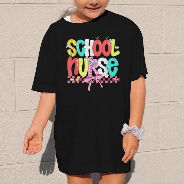 School Nurse Appreciation Day Coquette Bow Back To School Graphic Kid T-Shirt School Nurse Appreciation Day Coquette Bow Back To School Graphic Kid T-Shirt