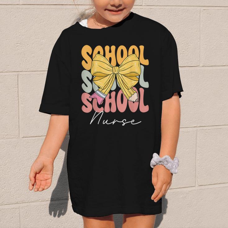 School Nurse Groovy Coquette Bow Cute Back To School Graphic Kid T-Shirt