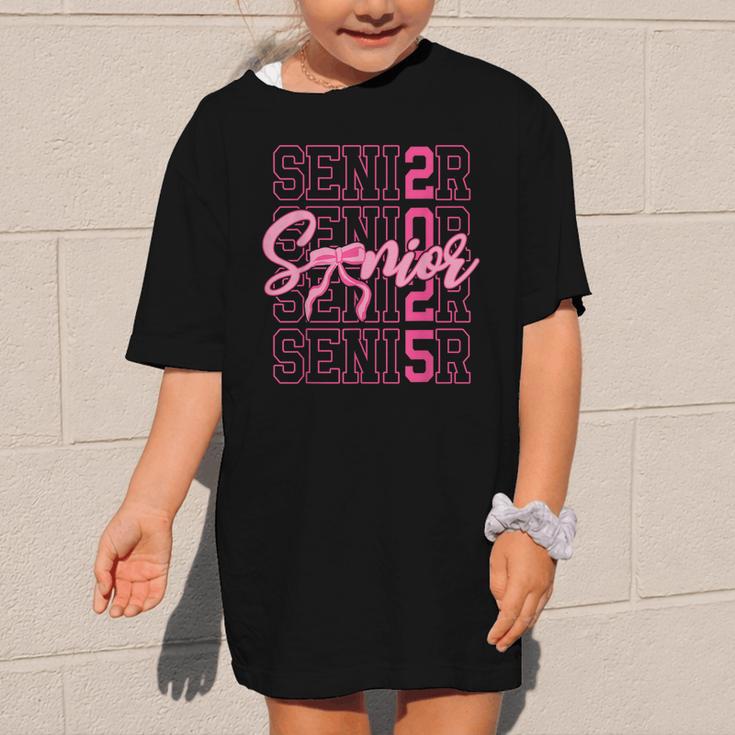 Senior 2025 Coquette Pink Bow Class Of 2025 Back To School Graphic Kid T-Shirt Senior 2025 Coquette Pink Bow Class Of 2025 Back To School Graphic Kid T-Shirt