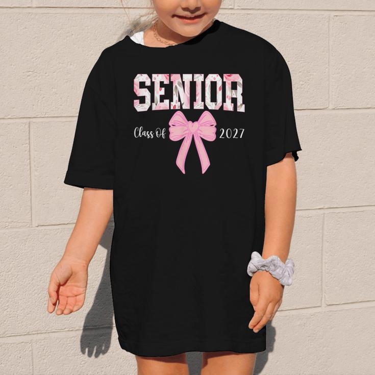 Senior 2027 Floral Pink Bow Back To School Class Of 2027 Graphic Kid T-Shirt Senior 2027 Floral Pink Bow Back To School Class Of 2027 Graphic Kid T-Shirt