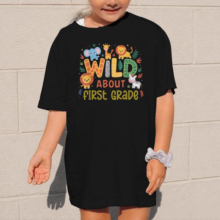 Wild About First Grade Safari Jungle Animals Back To School Graphic Kid T-Shirt Wild About First Grade Safari Jungle Animals Back To School Graphic Kid T-Shirt