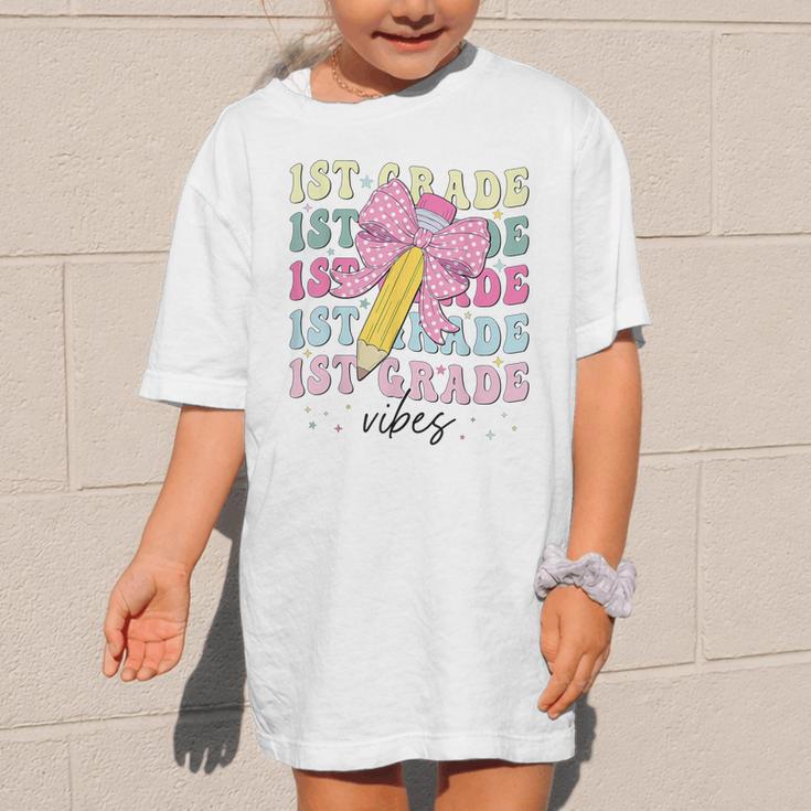 1st Grade Vibes Girl Coquette Bow First Grade Back To School Graphic Kid T-Shirt 1st Grade Vibes Girl Coquette Bow First Grade Back To School Graphic Kid T-Shirt