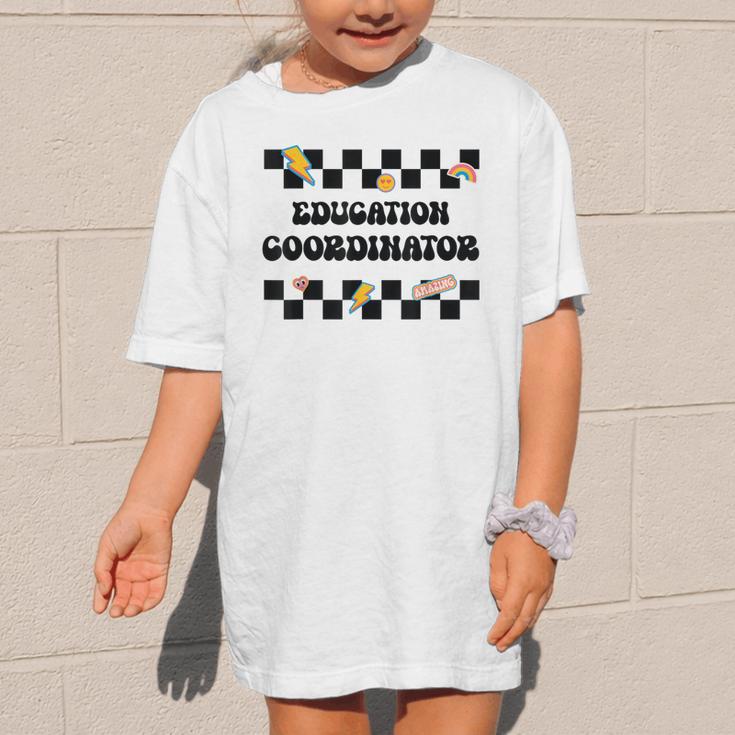 Education Coordinator Groovy Back To School Checkered Graphic Kid T-Shirt Education Coordinator Groovy Back To School Checkered Graphic Kid T-Shirt