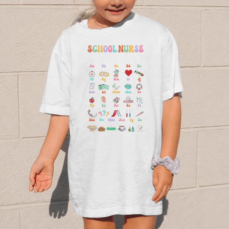 Groovy Cute ABC School Nurse Alphabet Back To School Women Graphic Kid T-Shirt Groovy Cute ABC School Nurse Alphabet Back To School Women Graphic Kid T-Shirt