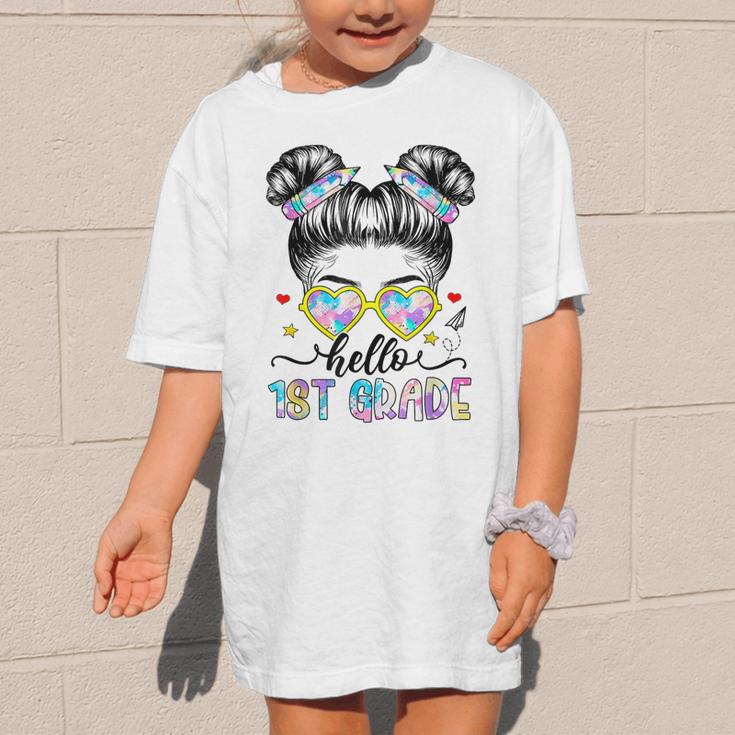 Hello 1st Grade Messy Bun Girl Back To School First Day Graphic Kid T-Shirt Hello 1st Grade Messy Bun Girl Back To School First Day Graphic Kid T-Shirt