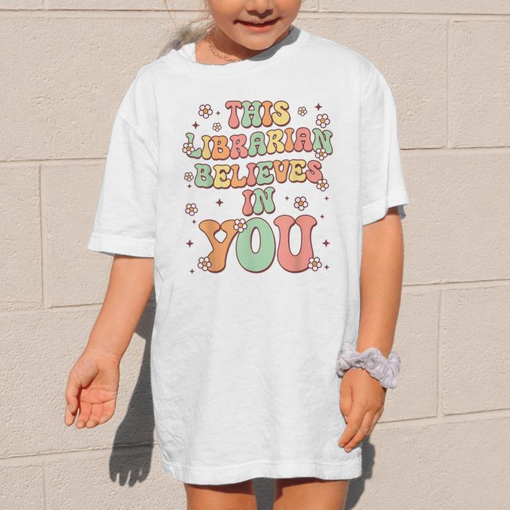 This Librarian Believes In You Groovy Back To School Graphic Kid T-Shirt