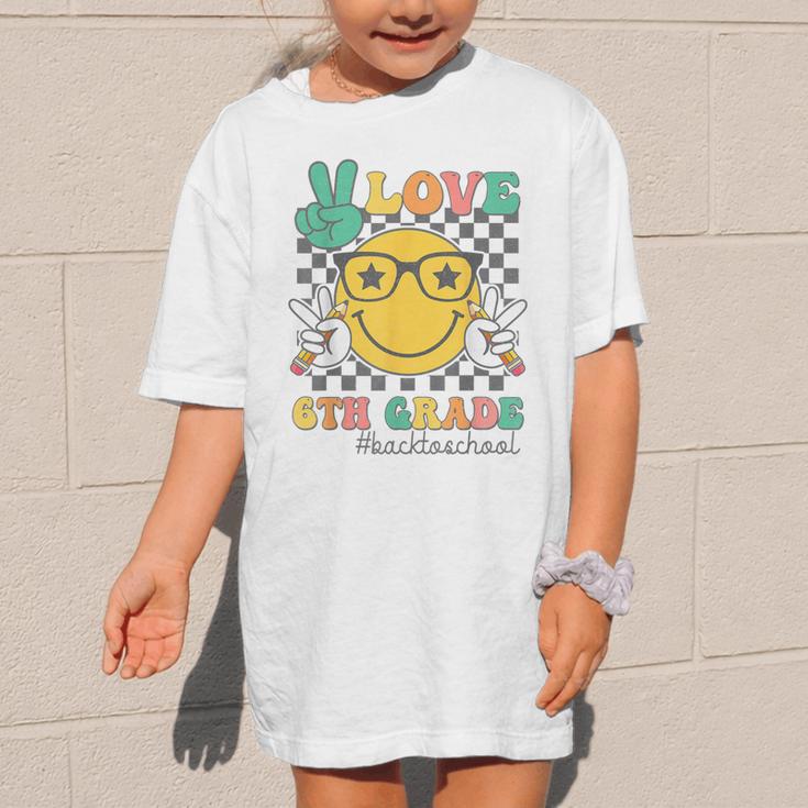 Peace Love 6th Grade Cute Smile Face Back To School Girls Graphic Kid T-Shirt Peace Love 6th Grade Cute Smile Face Back To School Girls Graphic Kid T-Shirt