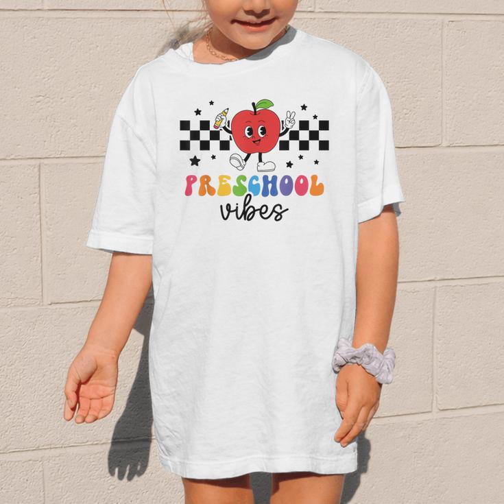 Preschool Vibes Retro Groovy Apple Back To School Graphic Kid T-Shirt Preschool Vibes Retro Groovy Apple Back To School Graphic Kid T-Shirt