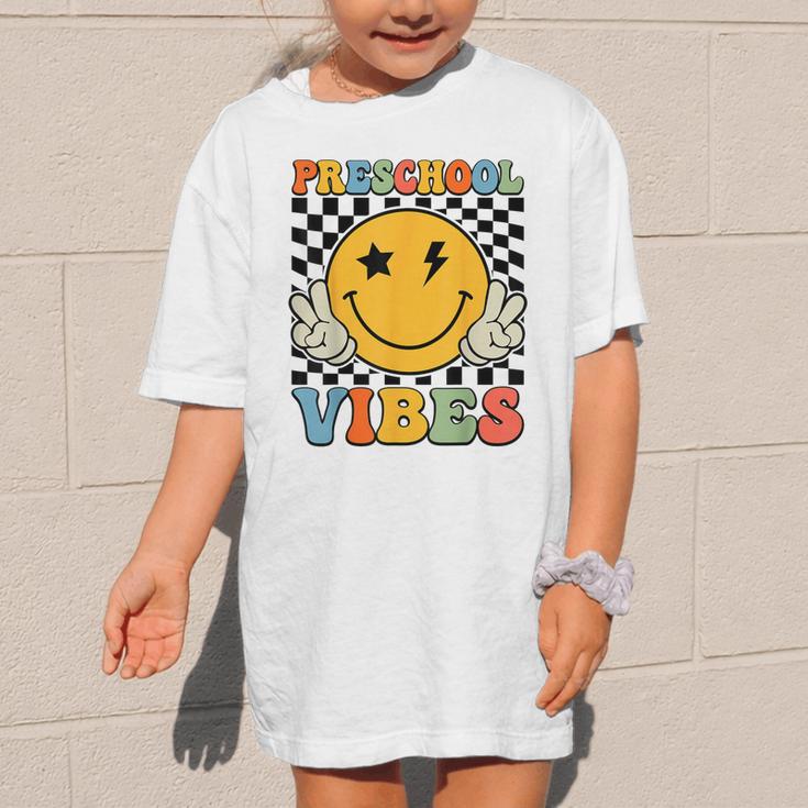 Preschool Vibes Retro Groovy Back To School Pre-K Graphic Kid T-Shirt Preschool Vibes Retro Groovy Back To School Pre-K Graphic Kid T-Shirt