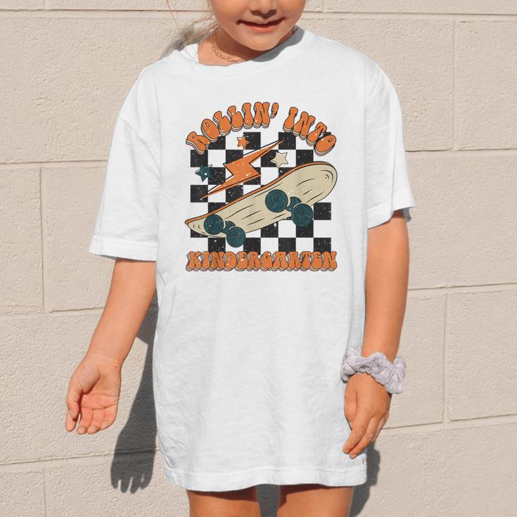 Rolling Into Kindergarten Retro Groovy Back To School Kids Graphic Kid T-Shirt Rolling Into Kindergarten Retro Groovy Back To School Kids Graphic Kid T-Shirt