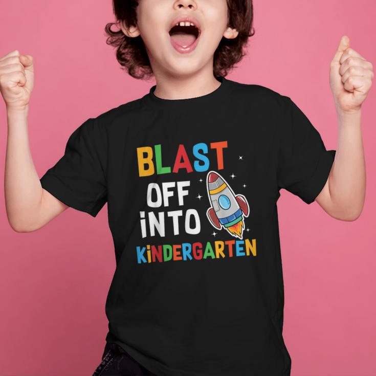 Blast Off Into Kindergarten Back To School Rocket Graphic Kid T-Shirt Blast Off Into Kindergarten Back To School Rocket Graphic Kid T-Shirt