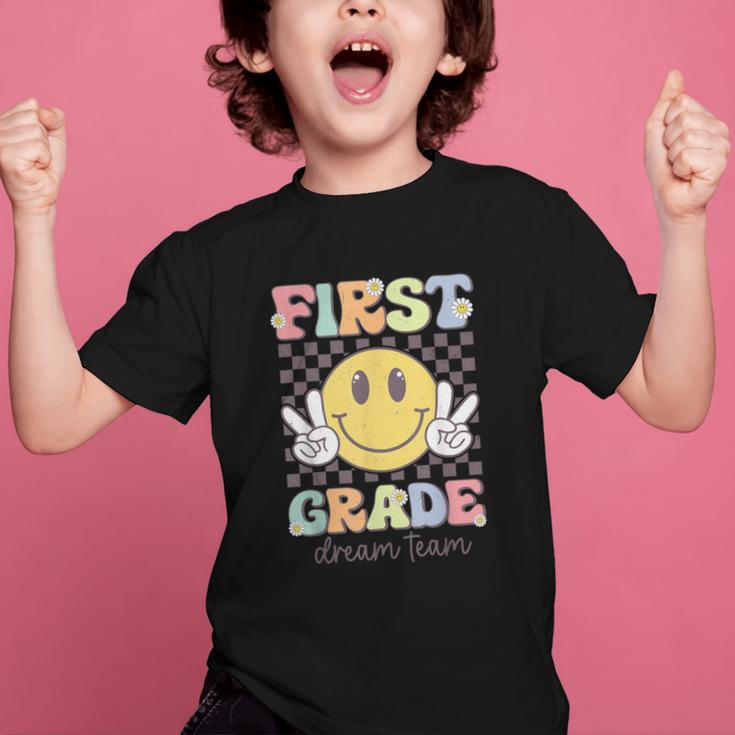 First Grade Dream Team Smile Face Back To School 1st Grade Graphic Kid T-Shirt First Grade Dream Team Smile Face Back To School 1st Grade Graphic Kid T-Shirt