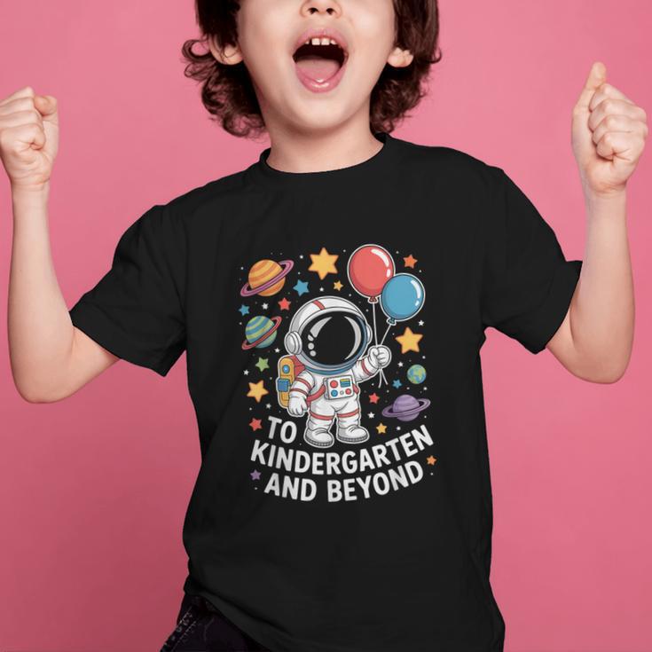 To Kindergarten And Beyond Astronaut Space Back To School Graphic Kid T-Shirt To Kindergarten And Beyond Astronaut Space Back To School Graphic Kid T-Shirt