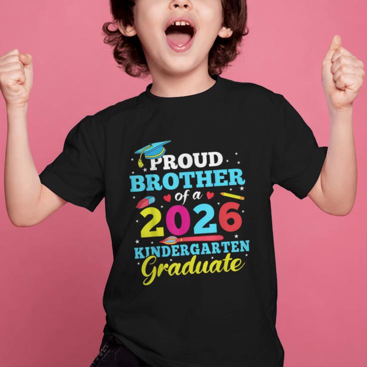 Proud Brother Of 2026 Kindergarten Graduate Back To School Graphic Kid T-Shirt Proud Brother Of 2026 Kindergarten Graduate Back To School Graphic Kid T-Shirt