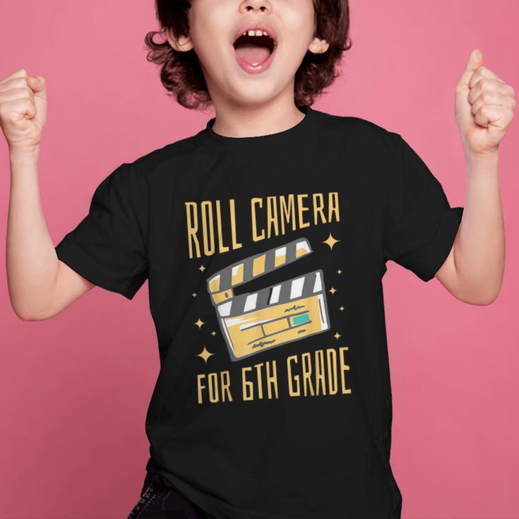 Roll Camera For 6th Grade Movie Lover Back To School Graphic Kid T-Shirt Roll Camera For 6th Grade Movie Lover Back To School Graphic Kid T-Shirt