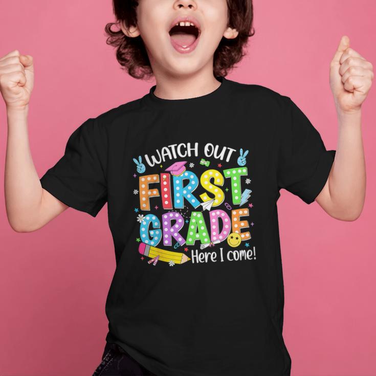 Watch Out First Grade Here I Come Back To School 1st Grade Graphic Kid T-Shirt Watch Out First Grade Here I Come Back To School 1st Grade Graphic Kid T-Shirt