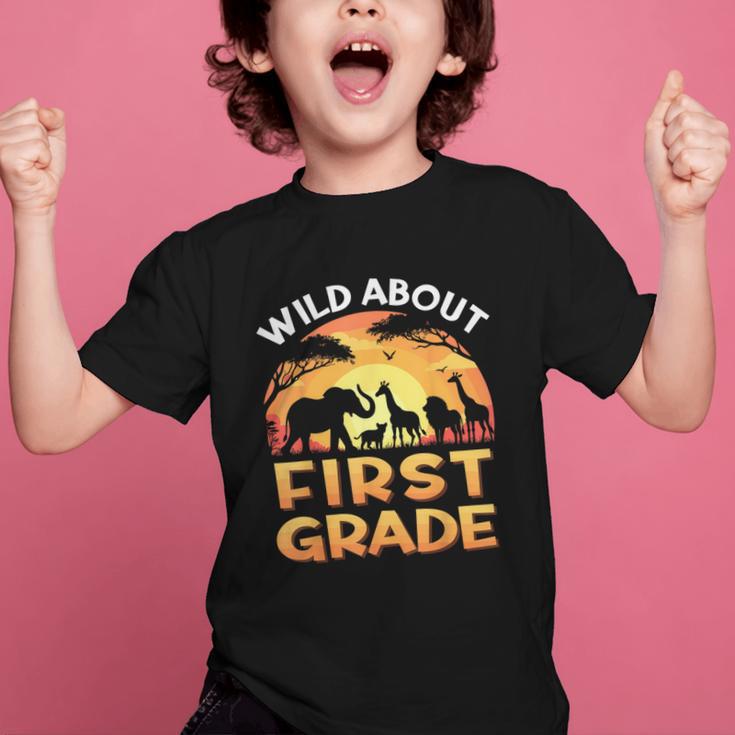 Wild About First Grade Zoo Animals Back To School Safari Graphic Kid T-Shirt Wild About First Grade Zoo Animals Back To School Safari Graphic Kid T-Shirt