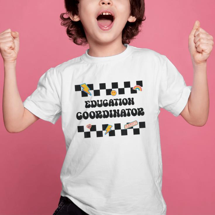 Education Coordinator Groovy Back To School Checkered Graphic Kid T-Shirt Education Coordinator Groovy Back To School Checkered Graphic Kid T-Shirt