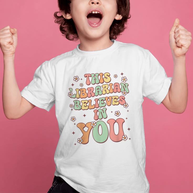 This Librarian Believes In You Groovy Back To School Graphic Kid T-Shirt