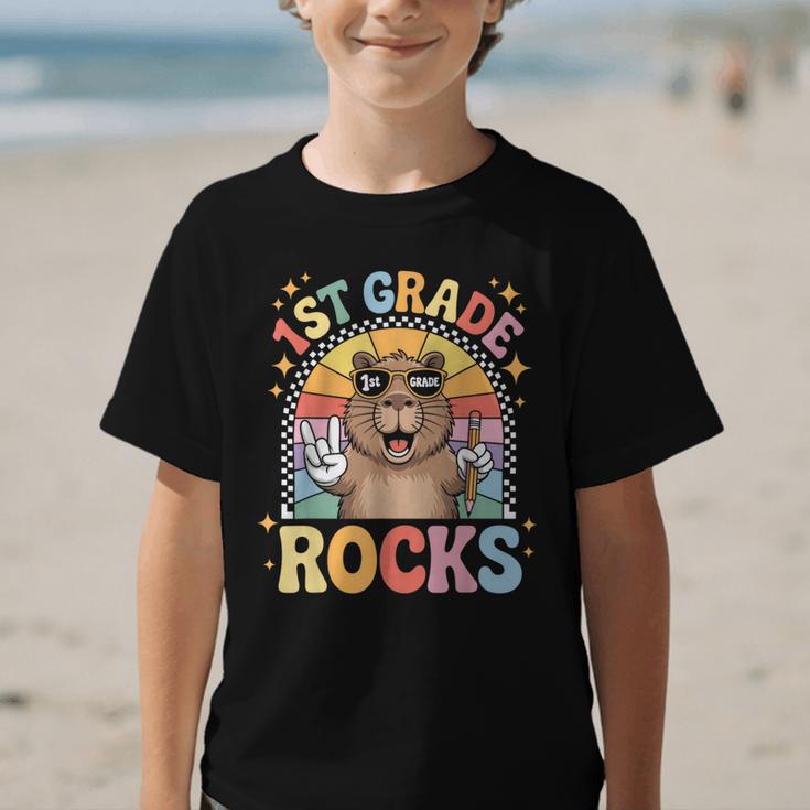 Back To School 1st Grade Capybara First Grade Rocks Graphic Kid T-Shirt Back To School 1st Grade Capybara First Grade Rocks Graphic Kid T-Shirt