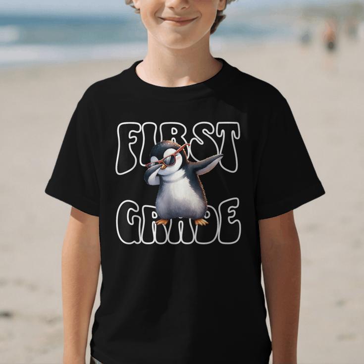 Cute Dabbing Penguin First Grade Back To School Graphic Kid T-Shirt Cute Dabbing Penguin First Grade Back To School Graphic Kid T-Shirt
