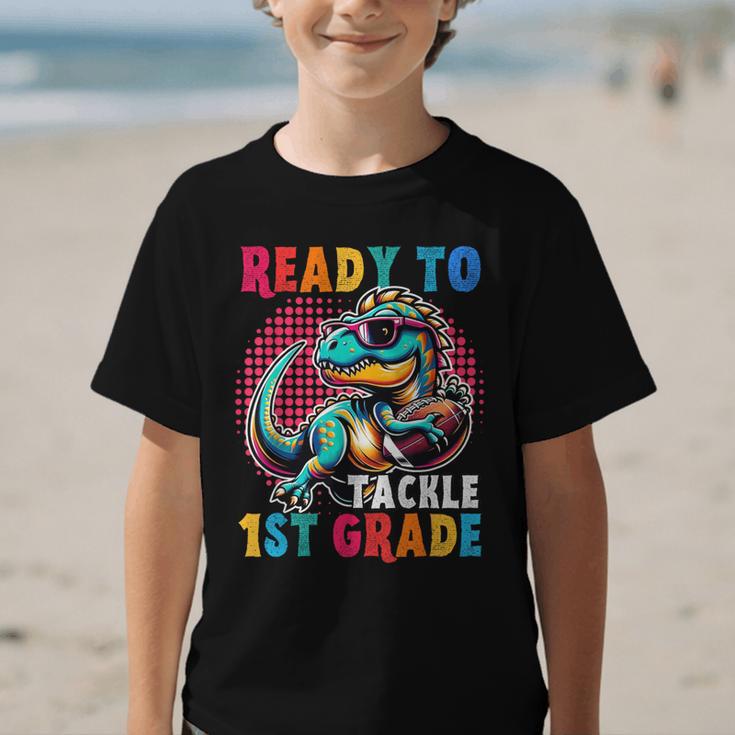 First Day Back To School 1st Grade Boys Football Dinosaur Graphic Kid T-Shirt First Day Back To School 1st Grade Boys Football Dinosaur Graphic Kid T-Shirt