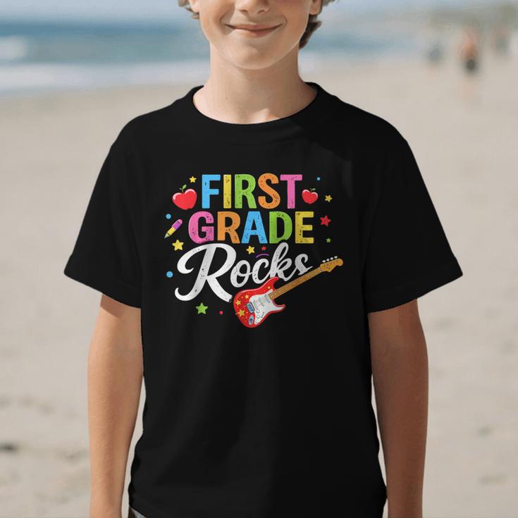 First Grade Rocks Colorful Back To School Guitar Graphic Kid T-Shirt First Grade Rocks Colorful Back To School Guitar Graphic Kid T-Shirt
