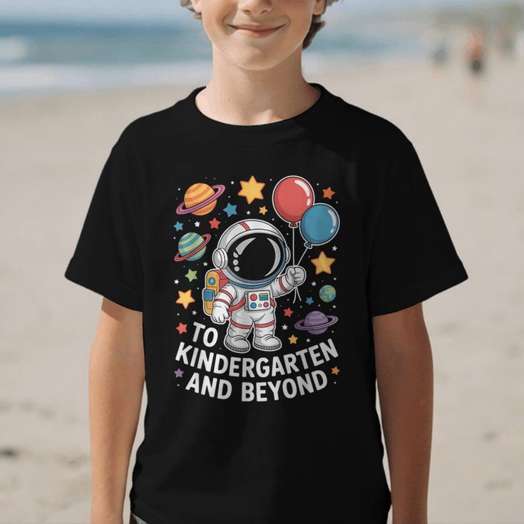 To Kindergarten And Beyond Astronaut Space Back To School Graphic Kid T-Shirt To Kindergarten And Beyond Astronaut Space Back To School Graphic Kid T-Shirt