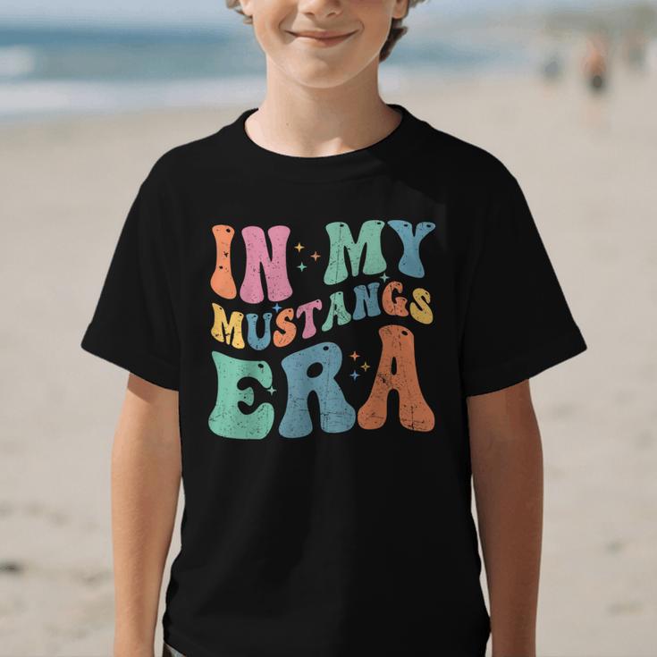 In My Mustangs Era Back To School Spirit Game Retro Groovy Graphic Kid T-Shirt In My Mustangs Era Back To School Spirit Game Retro Groovy Graphic Kid T-Shirt