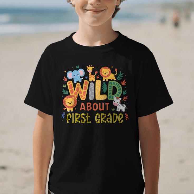 Wild About First Grade Safari Jungle Animals Back To School Graphic Kid T-Shirt Wild About First Grade Safari Jungle Animals Back To School Graphic Kid T-Shirt