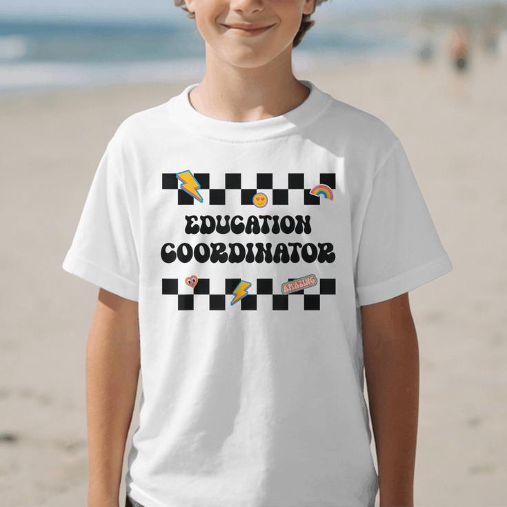 Education Coordinator Groovy Back To School Checkered Graphic Kid T-Shirt Education Coordinator Groovy Back To School Checkered Graphic Kid T-Shirt