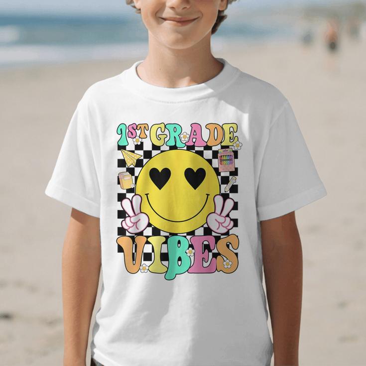 Girls 1st Grade Vibes Smile Face Back To School First Grade Graphic Kid T-Shirt Girls 1st Grade Vibes Smile Face Back To School First Grade Graphic Kid T-Shirt