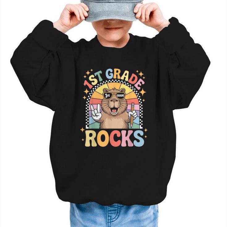 Back To School 1st Grade Capybara First Grade Rocks Graphic Kid Sweatshirt Back To School 1st Grade Capybara First Grade Rocks Graphic Kid Sweatshirt