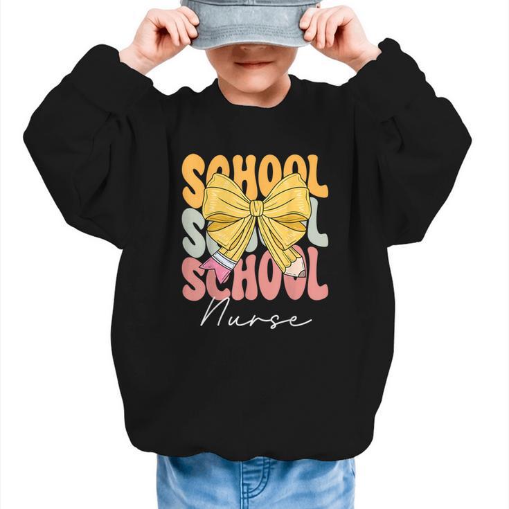 School Nurse Groovy Coquette Bow Cute Back To School Graphic Kid Sweatshirt