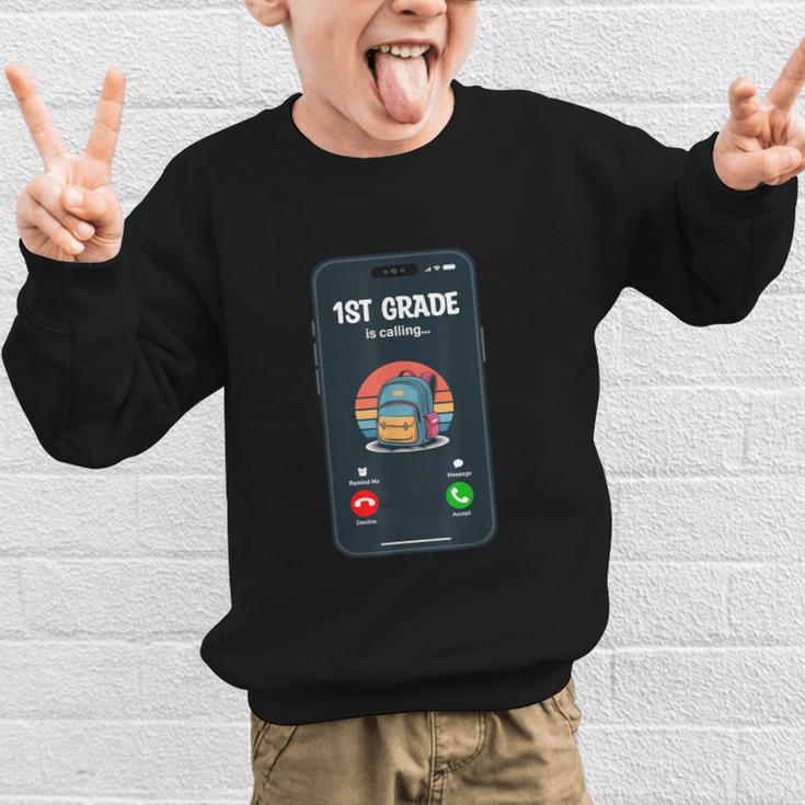 1st Grade Is Calling First Day Back To School First Grade Graphic Kid Sweatshirt 1st Grade Is Calling First Day Back To School First Grade Graphic Kid Sweatshirt