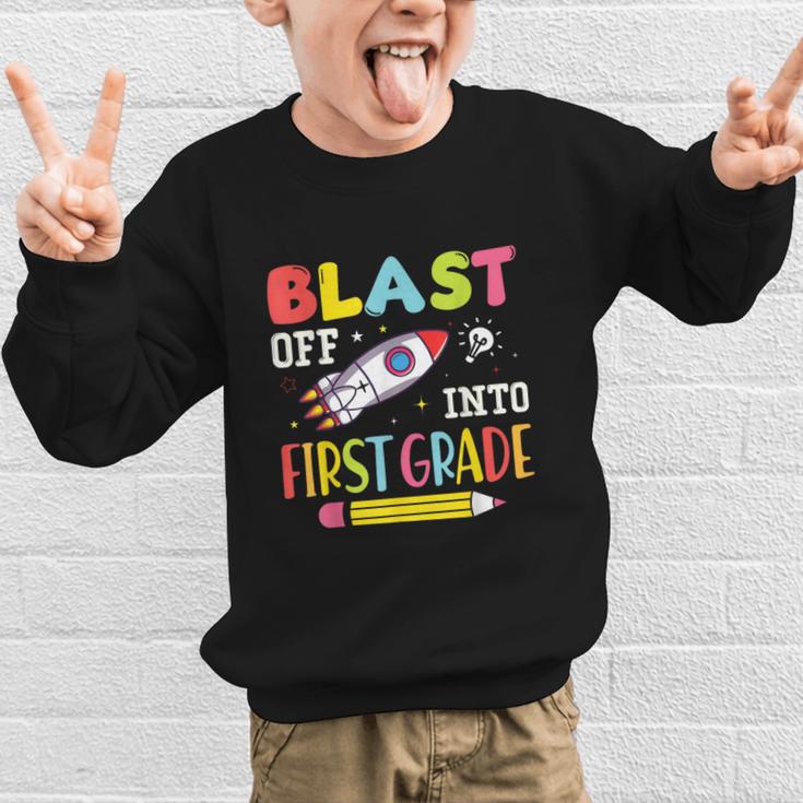 Blast Off Into First Grade Back To School Kids Rocket Space Graphic Kid Sweatshirt Blast Off Into First Grade Back To School Kids Rocket Space Graphic Kid Sweatshirt