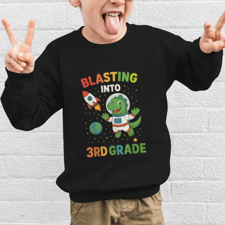 Blasting Into 3rd Grade Dinosaur Astronaut Back To School Graphic Kid Sweatshirt