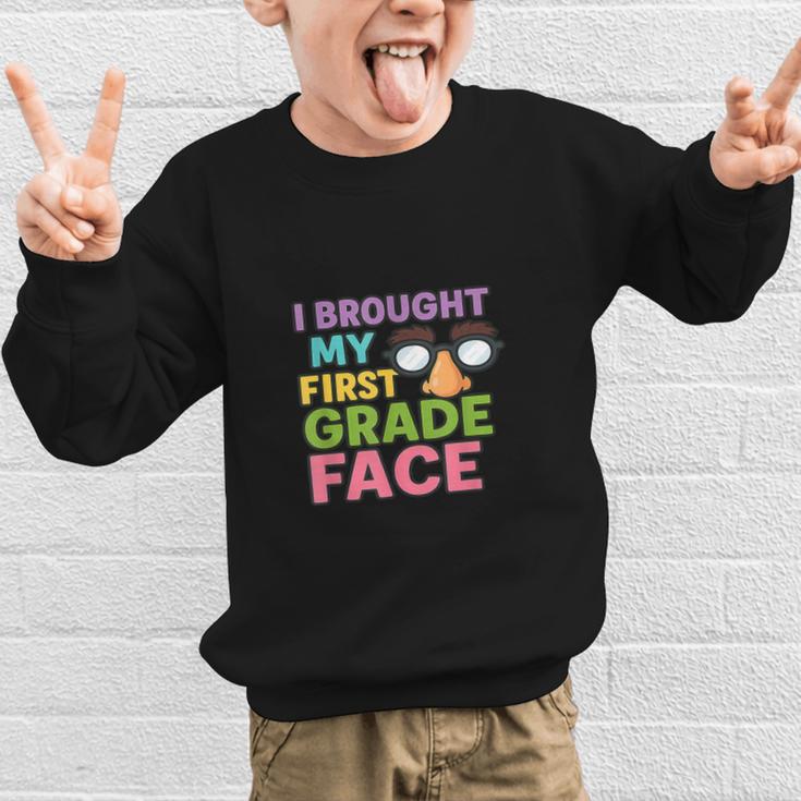 I Brought My First Grade Face First Day Back To School Graphic Kid Sweatshirt I Brought My First Grade Face First Day Back To School Graphic Kid Sweatshirt