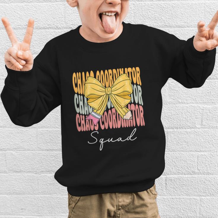 Chaos Coordinator Squad Groovy Coquette Bow Back To School Graphic Kid Sweatshirt