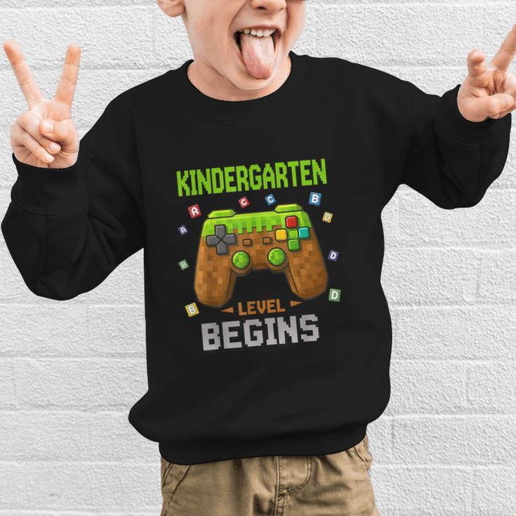 First Day Of Kindergarten Level Begins Back To School Graphic Kid Sweatshirt First Day Of Kindergarten Level Begins Back To School Graphic Kid Sweatshirt