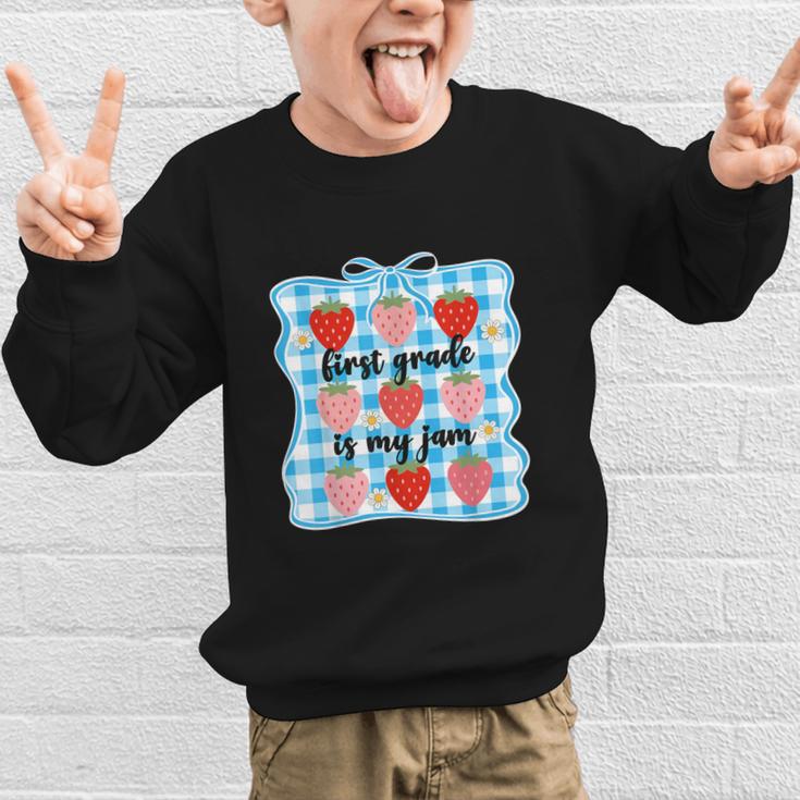 First Grade Is My Jam Strawberry 1st Grade Back To School Graphic Kid Sweatshirt First Grade Is My Jam Strawberry 1st Grade Back To School Graphic Kid Sweatshirt