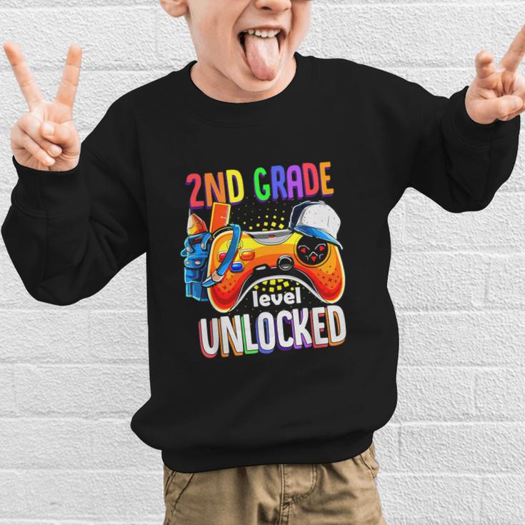 Gamer Back To School Gamepad 2nd Second Grade Level Unlocked Graphic Kid Sweatshirt Gamer Back To School Gamepad 2nd Second Grade Level Unlocked Graphic Kid Sweatshirt
