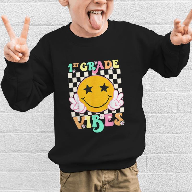Girls 1st Grade Vibes Smile Face Back To School 1st Grade Graphic Kid Sweatshirt Girls 1st Grade Vibes Smile Face Back To School 1st Grade Graphic Kid Sweatshirt