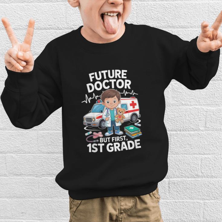 Kids Future Doctor 1st Grade Student Back To School Boy Kids Graphic Kid Sweatshirt Kids Future Doctor 1st Grade Student Back To School Boy Kids Graphic Kid Sweatshirt