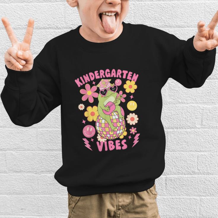 Kindergarten Vibes Groovy Kindergarten Back To School Frog Graphic Kid Sweatshirt Kindergarten Vibes Groovy Kindergarten Back To School Frog Graphic Kid Sweatshirt