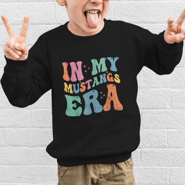 In My Mustangs Era Back To School Spirit Game Retro Groovy Graphic Kid Sweatshirt In My Mustangs Era Back To School Spirit Game Retro Groovy Graphic Kid Sweatshirt