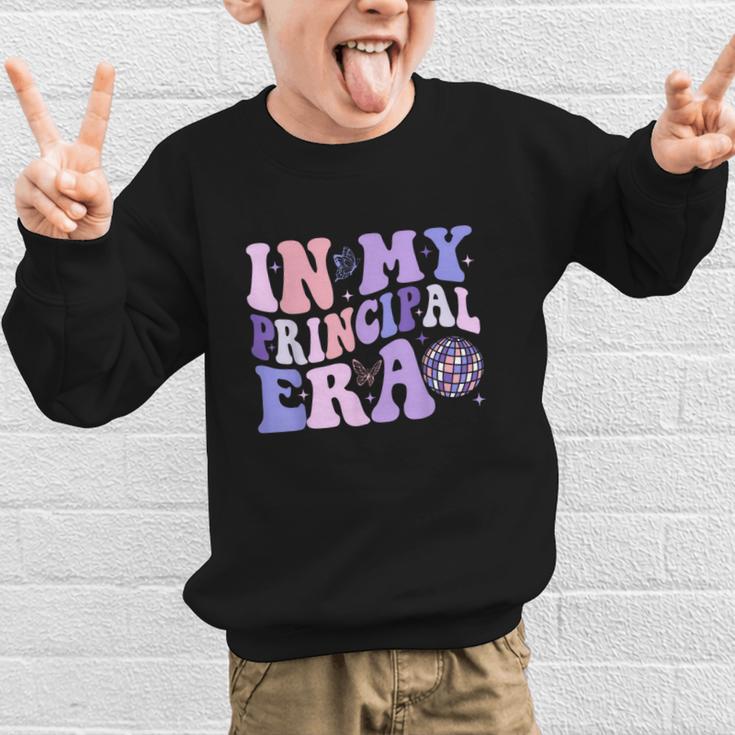 In My Principal Era Groovy School Headmaster Back To School Graphic Kid Sweatshirt In My Principal Era Groovy School Headmaster Back To School Graphic Kid Sweatshirt