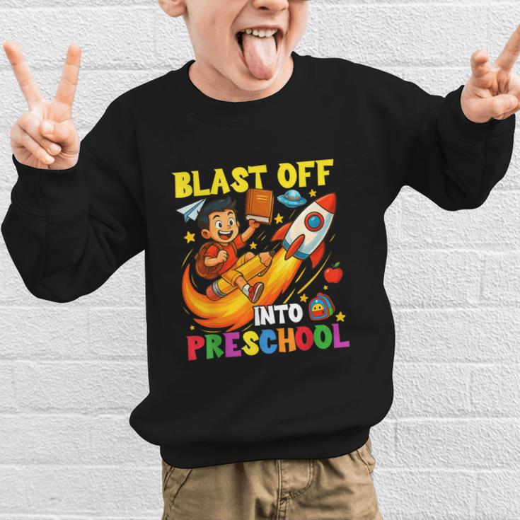 Rocket Blast Off Into Preschool Back To School Graphic Kid Sweatshirt Rocket Blast Off Into Preschool Back To School Graphic Kid Sweatshirt
